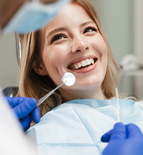 A woman at the dentist