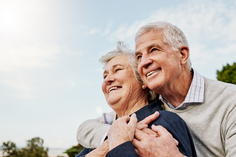 Senior couple with bright, healthy smiles